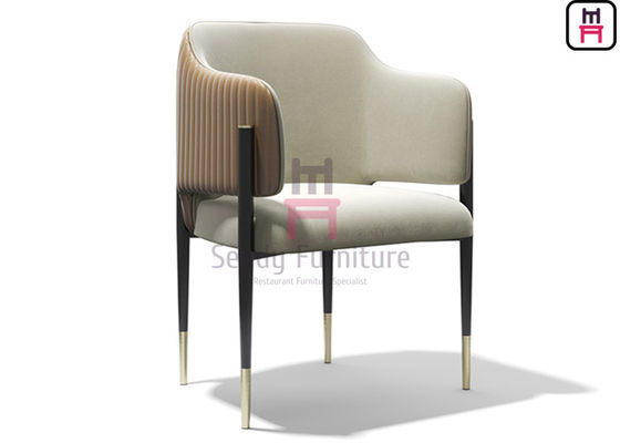 Buy 0.33cbm Tufted Open Back Leather Chair Metal Frame With Armrests online manufacture